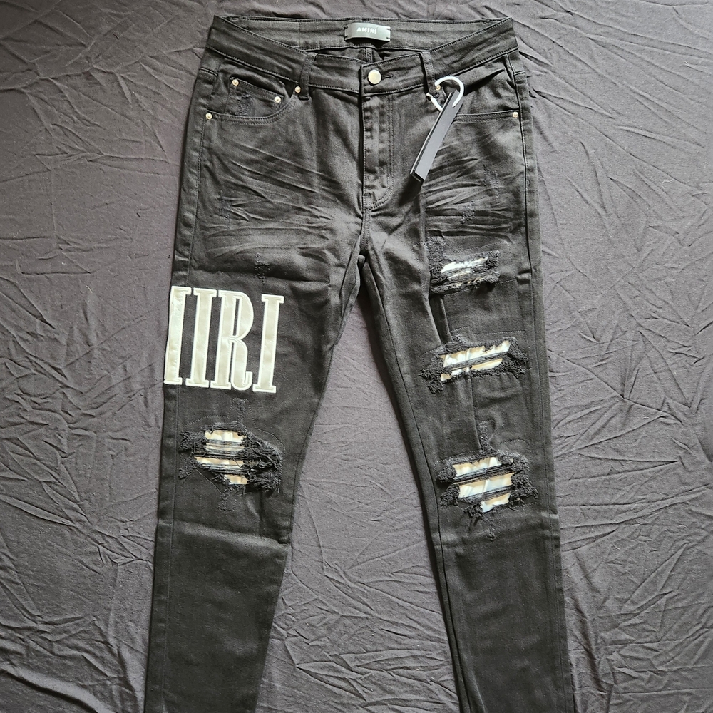 AMIRI Black Distressed Skinny Jeans with White Graphic